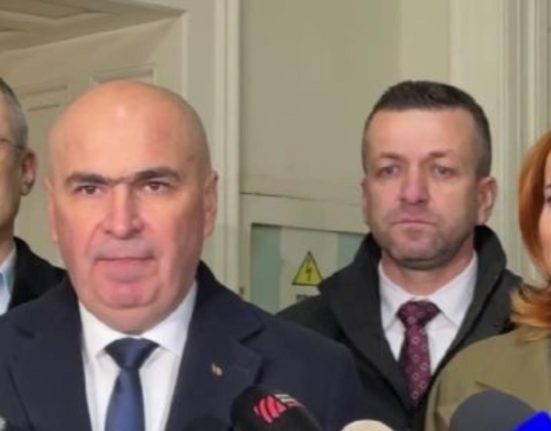 Legatura lui Bolojan cu fratia ce controleaza Romania
